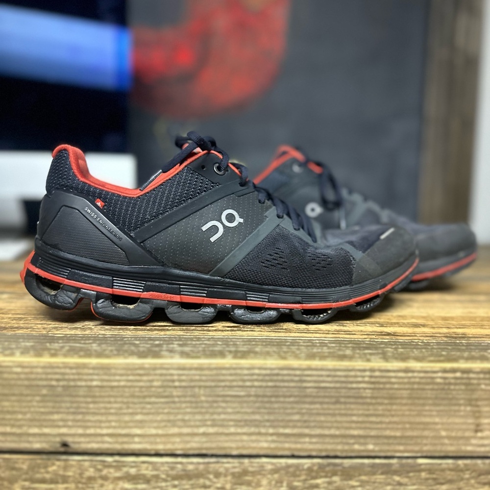 On Running Black and Red Athletic Shoes with Cushioned Sole